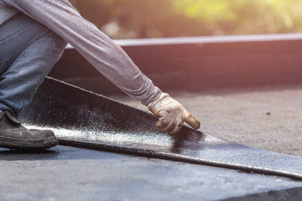 Professional Basement Waterproofing technician working in Stanley, WI